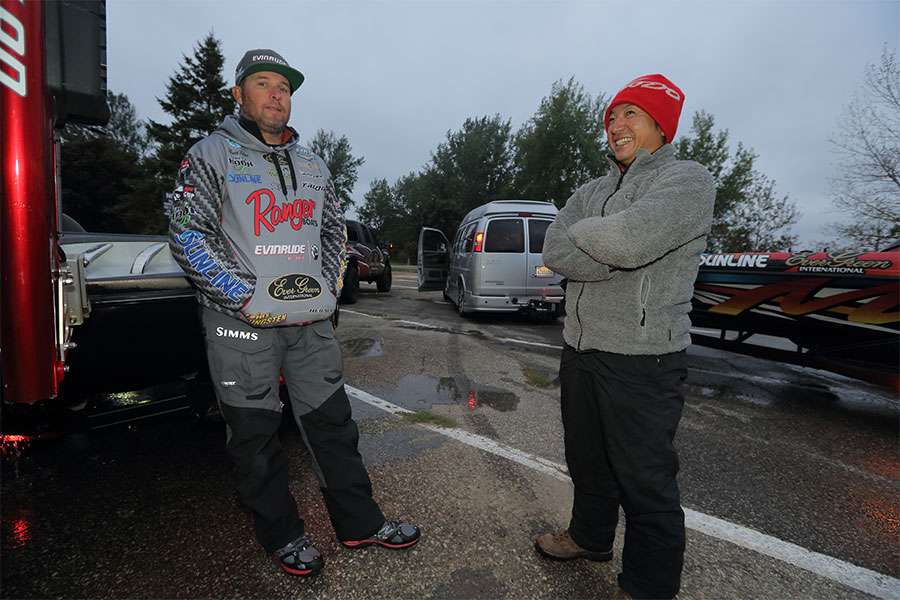 Brett Hite and Morizo Shimizu chat after they pulled their boats out of the water.