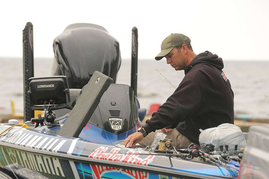 Todd Faircloth spent time on his boat to add some more tackle for next day.