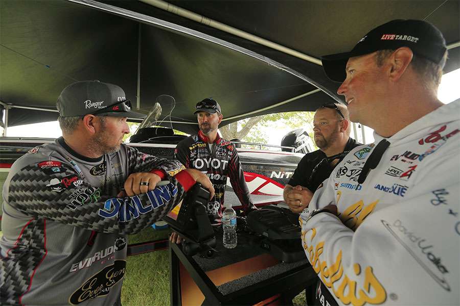 Brett Hite, Gerald Swindle and David Walker appear to be plotting against Mother Nature so they can fish Sunday.