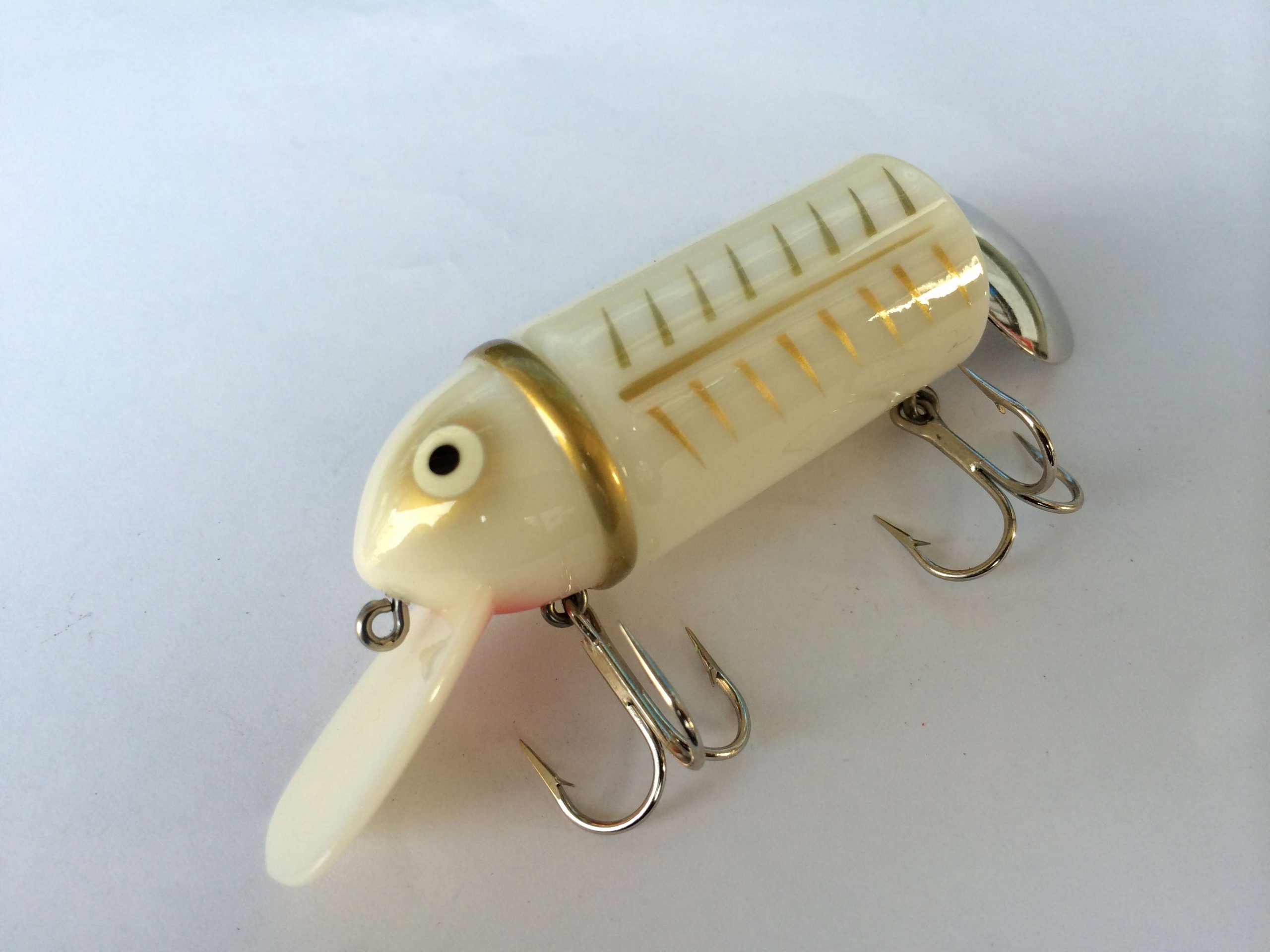 This one has a decent shad appearance with a classic Heddon scheme in gold.