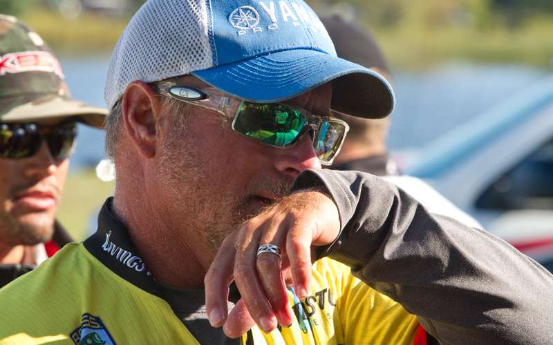 Jeff Kriet wipes his face while waiting to weigh, his 16-pound stringer put him within striking distance of a Classic berth.
