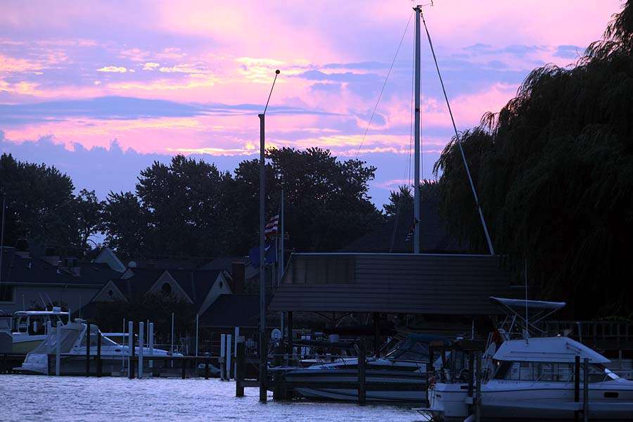 The sun begins to rise over Harrison Township on the shore of Lake St. Clair. 