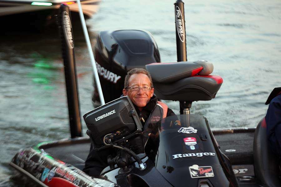 Smiling Charlie Hartley has smallmouth on his mind as he leaves the dock. 