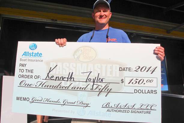 Kenneth Taylor, co-angler (43rd, 17-7), showing off his 'Good Hands, Great Day' check from Allstate.