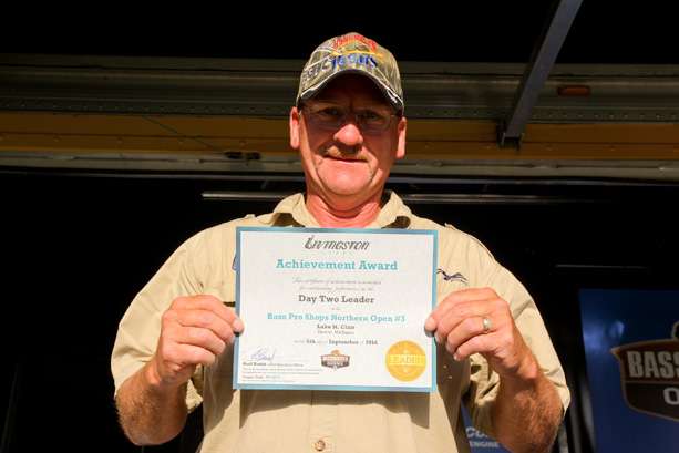 Langille with his Livingston Lures award for leading the co-angler division after Day 2.