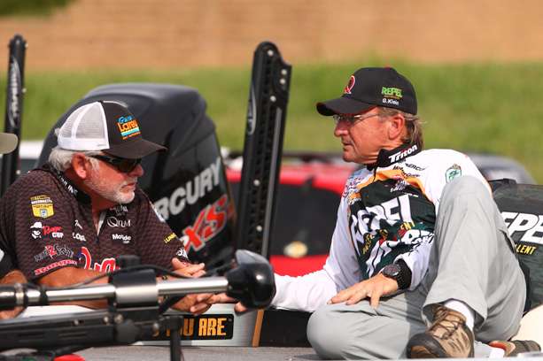 Bass legends Tommy Biffle and Gary Klein talk shop while waiting for their turn to weigh in at Bass Pro Shops in Broken Arrow, Okla.