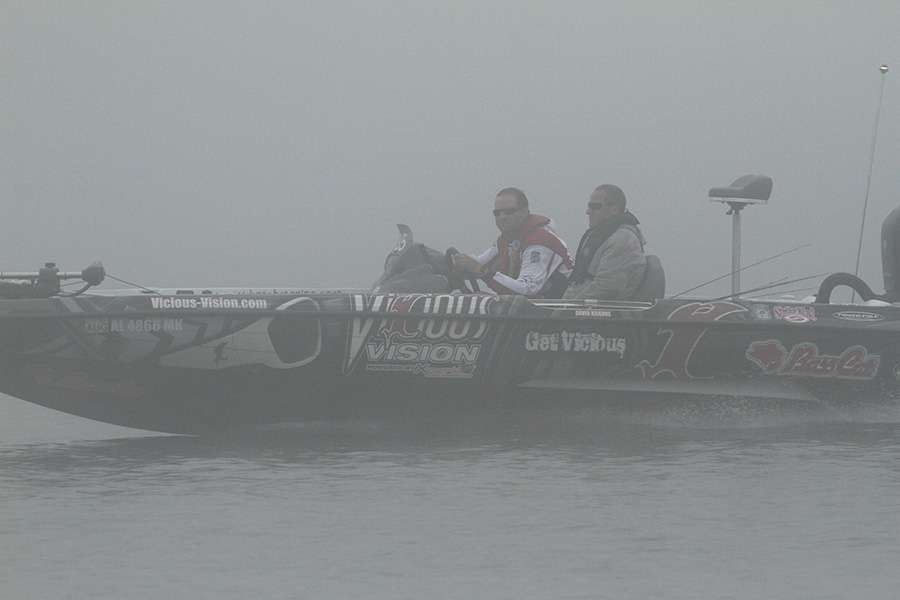 Smith Lake opens champion, David Kilgore, cruises past as fast as he can while driving safe through the fog.