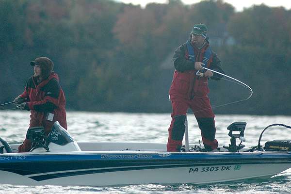 A Basstrek angler hooks a solid bass on Lake Erie.