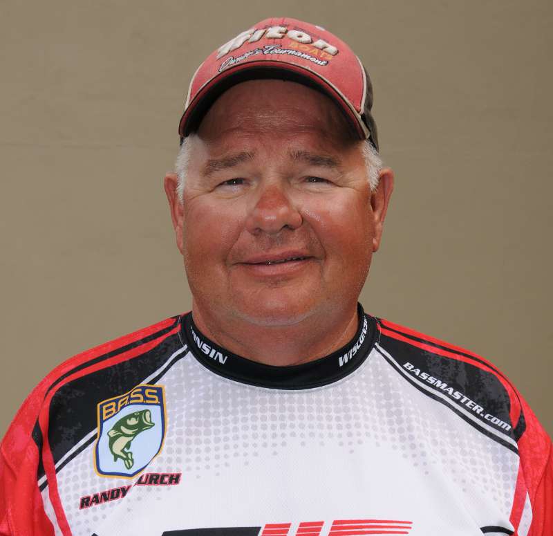 Randy Burch is Wisconsin through-and-through. One of his favorite things to do is watch the Packers. He must be pretty good at fishing in Wisconsin, too, because he's made the state team 17 times, and he's gone to the championship three times before. He fishes with the Flambeau Bassmasters, and to raise cash to support his hobby (and his five children and multiple grandchildren, too!), he works as a salesman for A&D Decks.