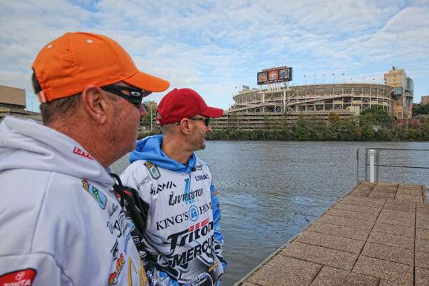 Howell and Walker await the coin toss to find who would have control of the boat during the first hour. 