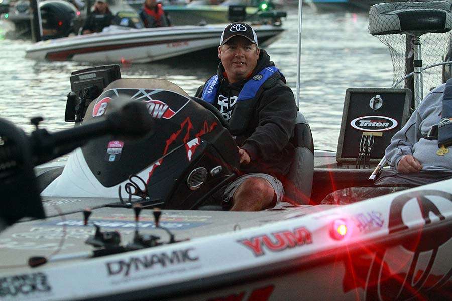 Elite Series pro Terry Scroggins idles past the safety check station at Blythe Landing. 