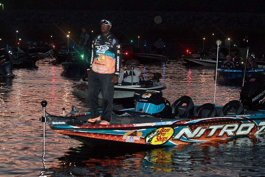Kendall Newson trolls the pileup in search of his co-angler for Day 2.