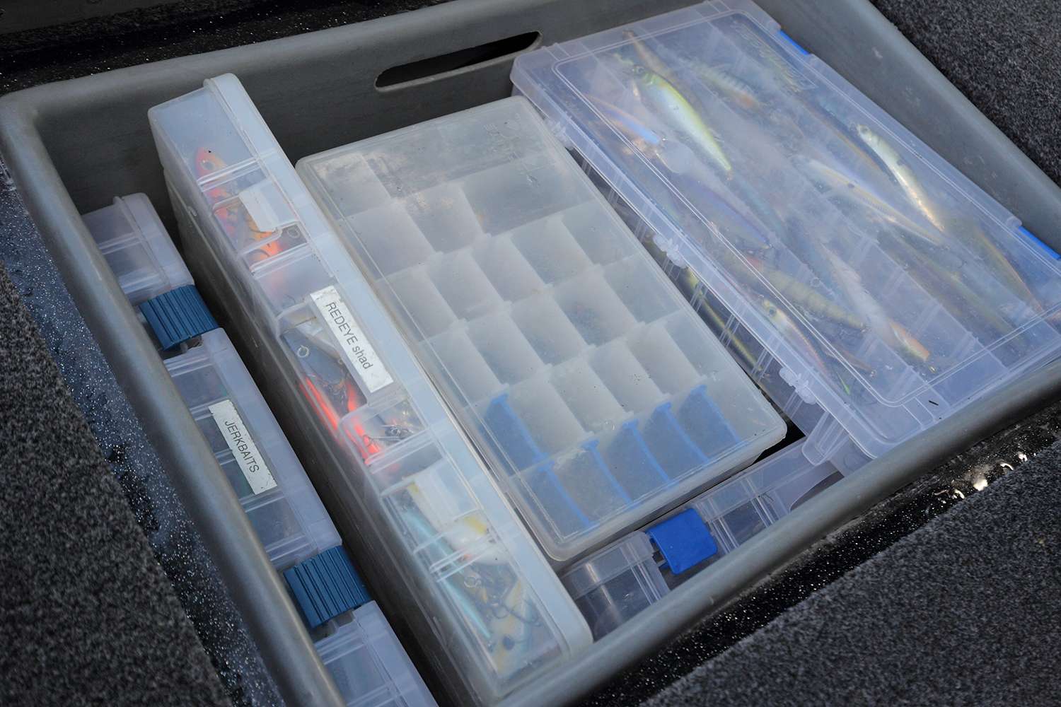 The box behind JVD's driverâs seat holds heavier items like tungsten, jerkbaits and crankbaits -- all in Plano boxes.