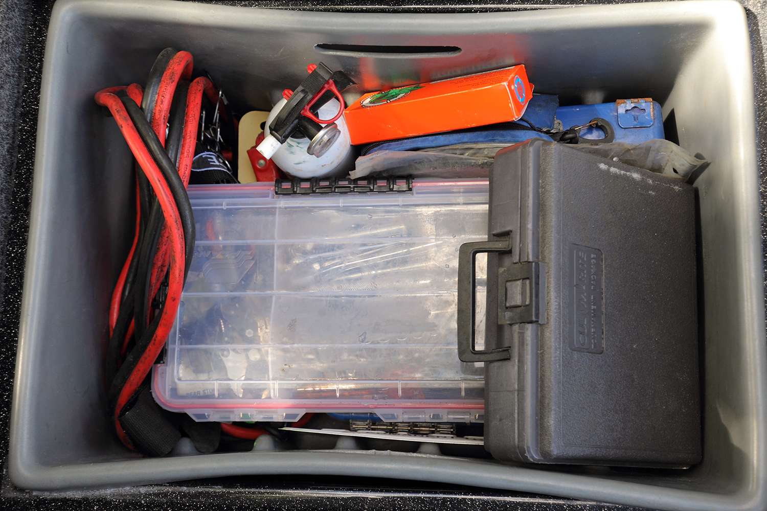 A box near the passenger seat holds all of VanDam's tools, a drill and his father's old Cul-M-Rite scale.