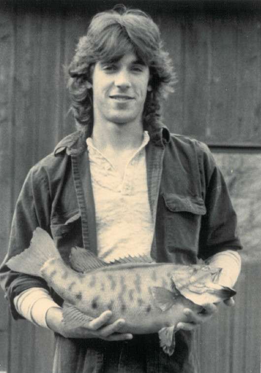 He caught a 5-pound, 7 1/2-ounce smallmouth in 1988, shown here holding a replica he had made of it. It was the largest smallmouth caught in Connecticut that year.