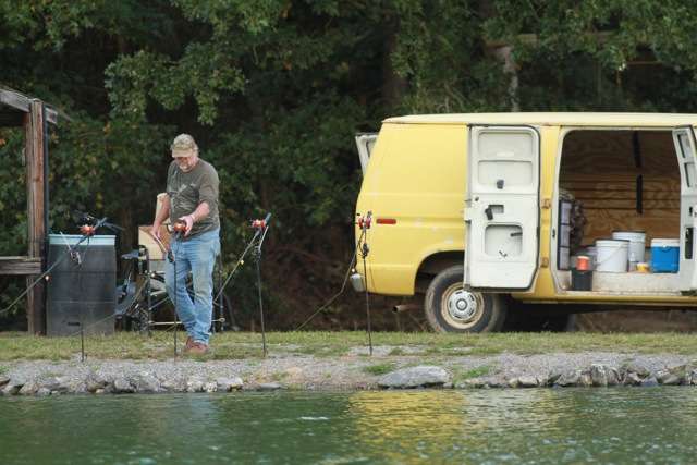 A work van makes the perfect vehicle for pay lake fishing, with rod holders added to the driver's side back panel and plenty of room for tackle.