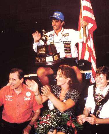 ... and Kerchal rode around the arena with his girlfriend and his parents, with an American flag and a Classic trophy, during his victory lap.