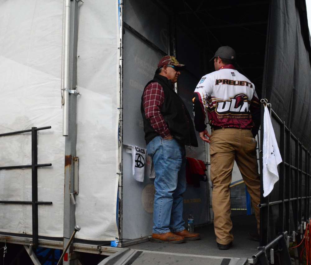 Preuett and Bruno wait behind the stage before Bassmaster emcee Dave Mercer introduces them.