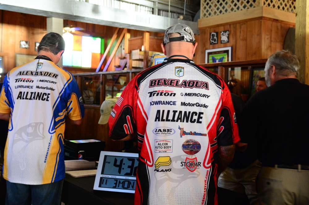 The first of the 59 competitors in the 2014 Old Milwaukee B.A.S.S. Nation Championship line up for registration at Warehouse #1 in Monroe, La.