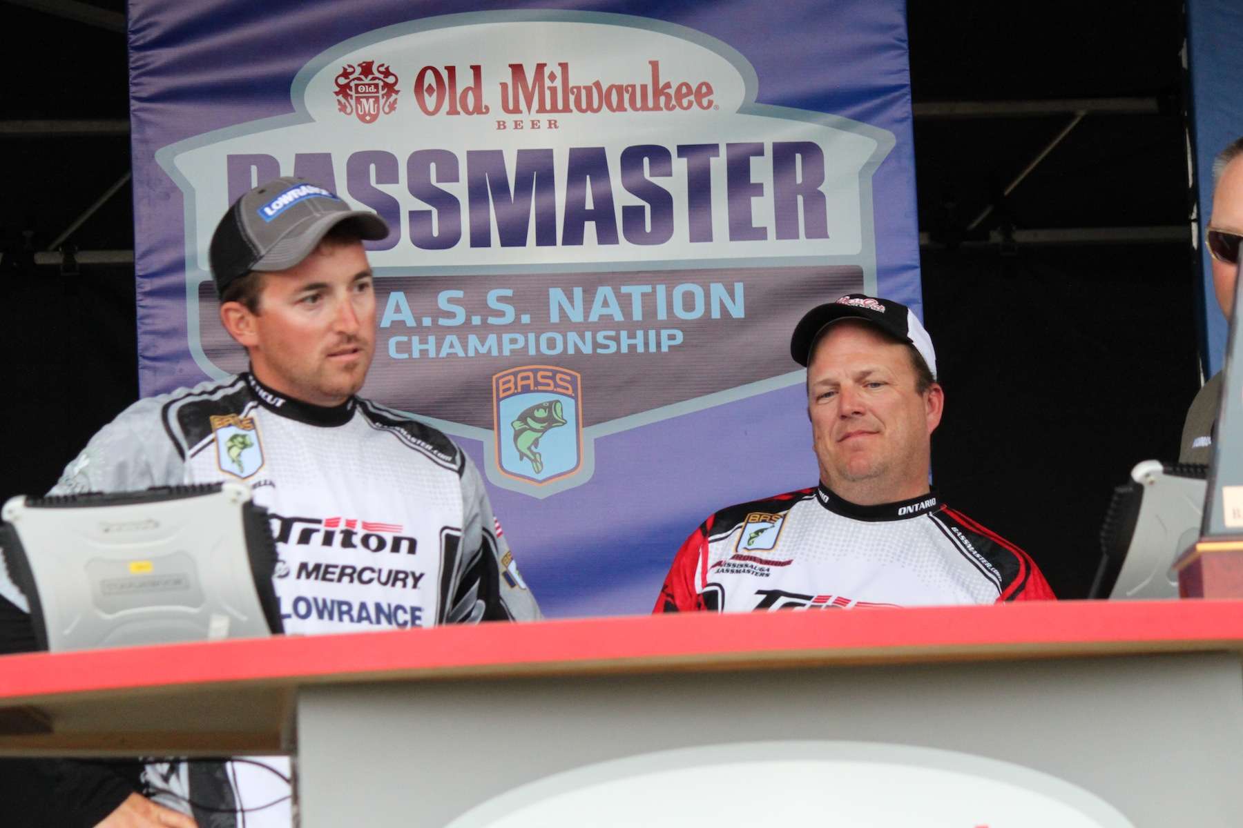 Paul Mueller and current leader in the Eastern Division, Doug Brownridge, watch as the scales lock in. 