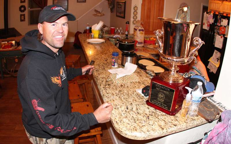 Today, the trophy still sits in his kitchen. The glass trophy in the cup is from a local event. His unassuming, quiet style is present even in his trophy case.