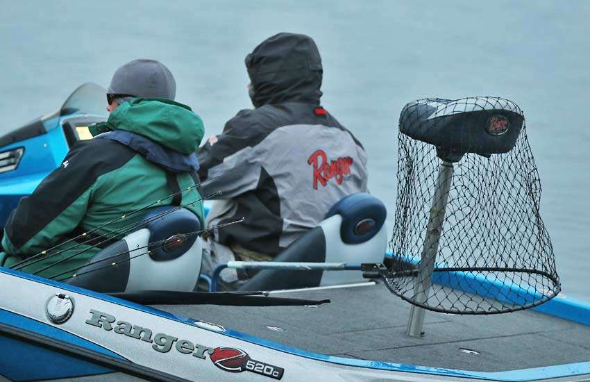 These anglers have their net ready for action.