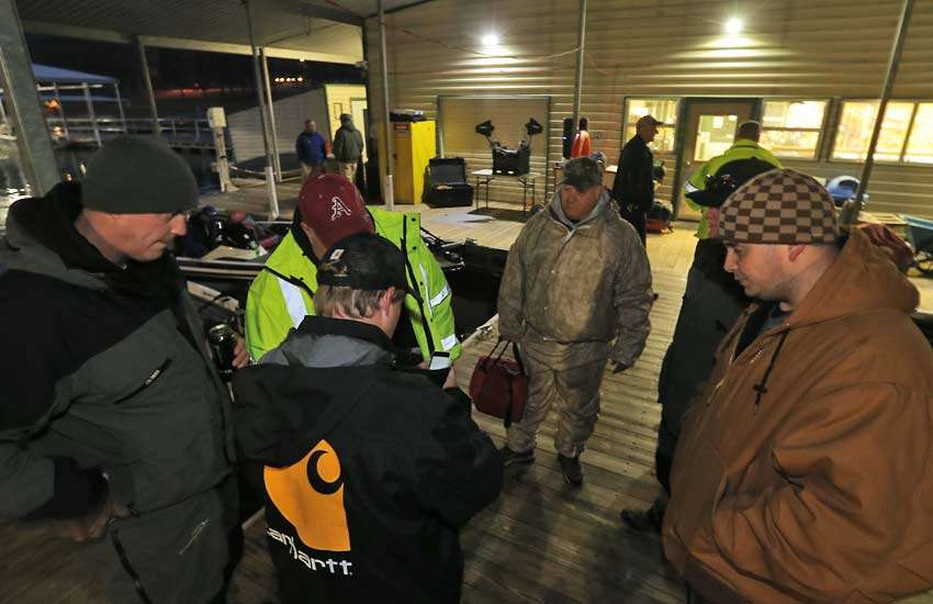 B.A.S.S. official Hank Weldon gives observers who will ride with the anglers a rundown of their responsibilities.