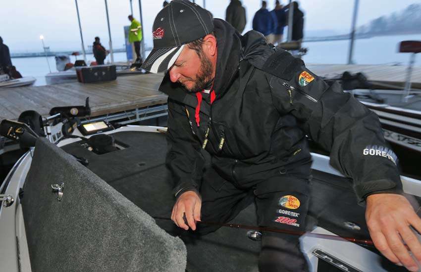 Only minutes before launch, Flannagan Fife pulls his rods out of the locker.