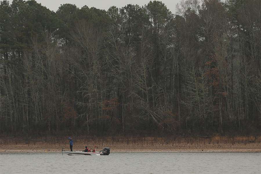 Stewart can be seen in the distance, looking for bass.