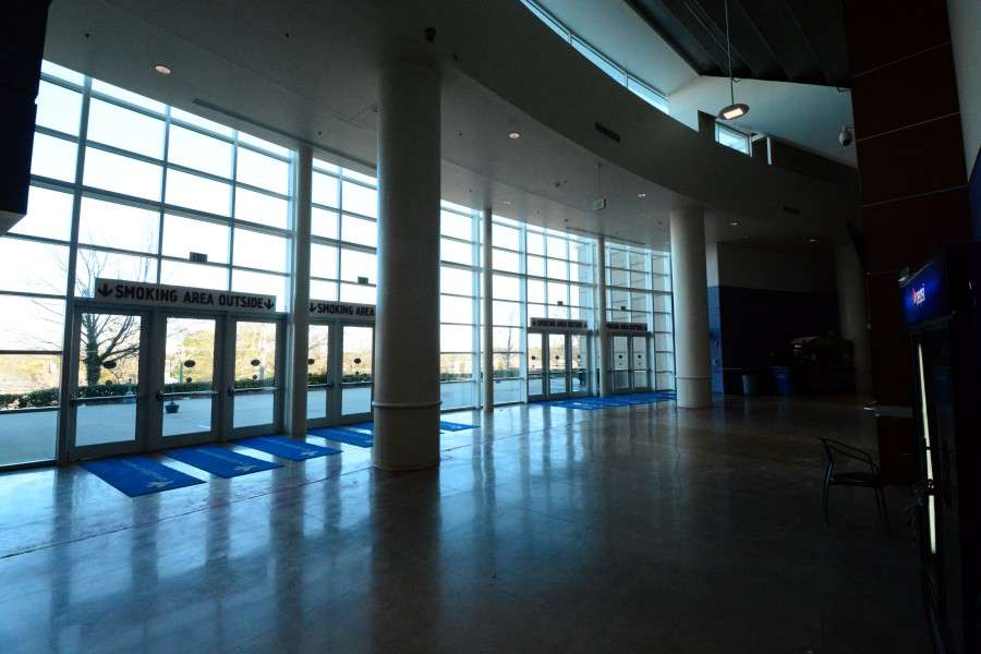 A glass entrance allows natural light into the facility.