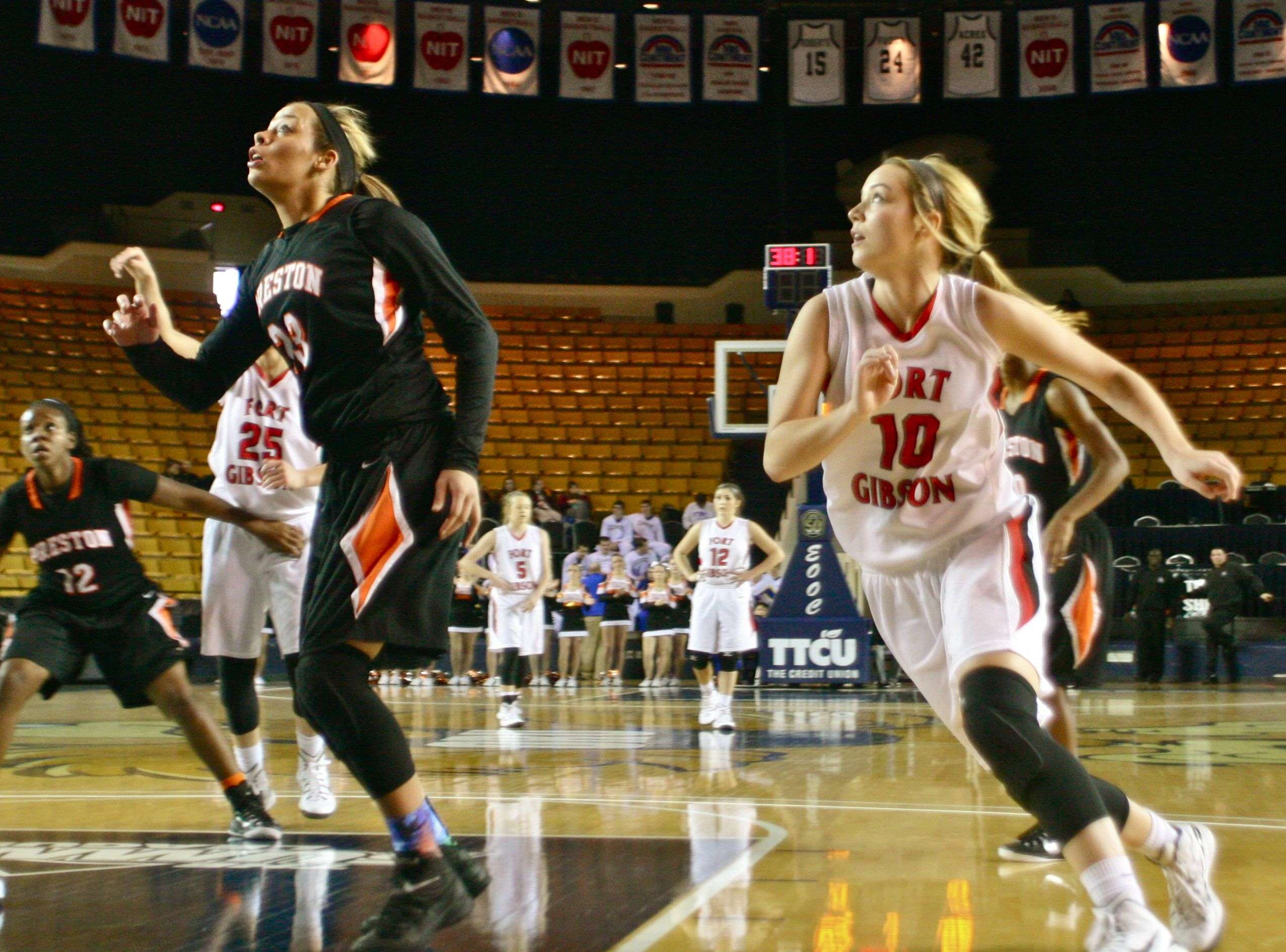 Christie hustles for rebound positioning against Preston's 5-11 junior Chelsea Dungee (23), who ESPN ranks as the nation's 27th best college prospect in the 2016 class. Fort Gibson beat Preston in overtime, 68-66, to win the 5th place trophy in the TOC and finish the three-day event with a 2-1 record.
