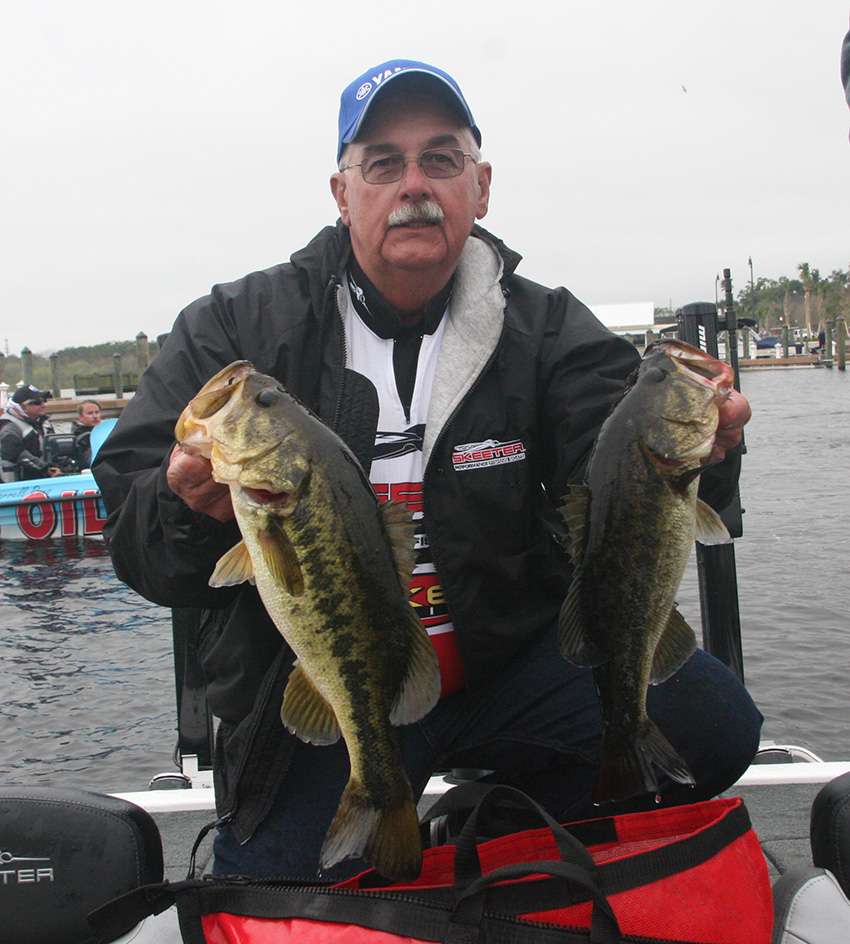 Stan Gunter holds up two of his better fish.