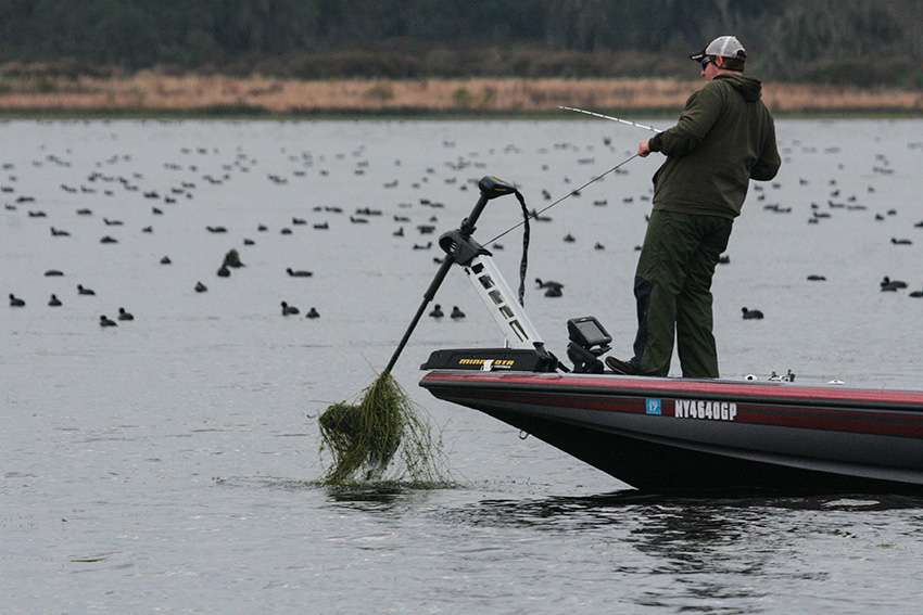 Every once in a while, Slegona had to clean off his trolling motor from all the Florida grass.