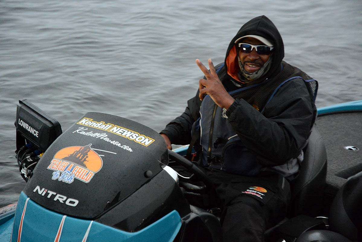 Kendall Newson gives the signal that today will be a better day for him on the Kissimmee Chain of Lakes. 