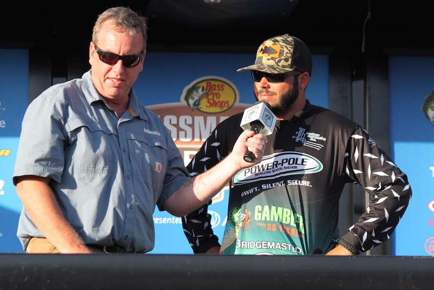 Garrett Rocamora steps to the scales. Rocamora caught the Carhartt Big Bass of the event on Day 1, a giant weighing 11-9. 