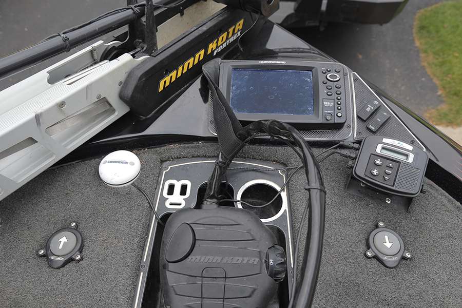 The front deck of Lintner's rig features Power Pole control switches to the left and right of his trolling motor foot pedal. 