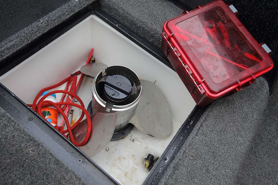 Lintner's floor box houses a spare prop and a waterproof day box with essentials like tools, black electrical tape and zip ties.