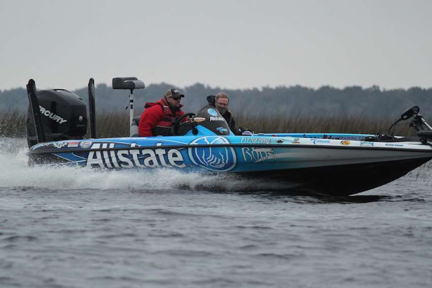 Rich Howes, who won the 2013 Toho Open, comes hook sliding in...