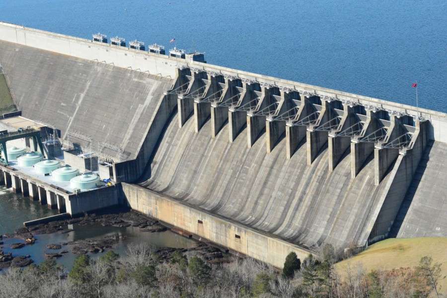 The top of the dam is 204 feet above the Savannah River bed, and the depth of the water behind the dam is approximately 180 feet.