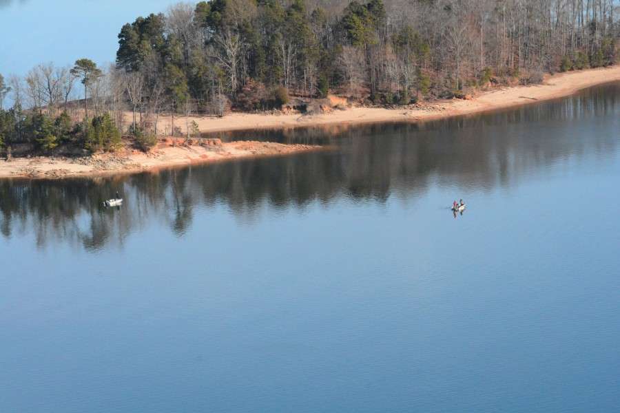 Two boats fish some of the 962 miles of shoreline that Hartwell has to offer.