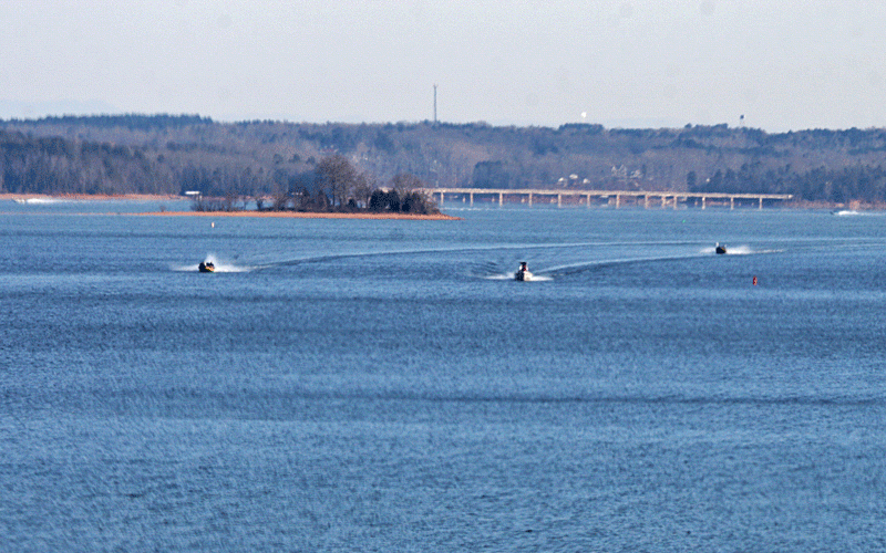 Three anglers head down toward the lower end of Lake Hartwell. 