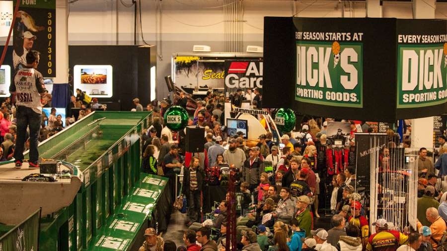 A big crowd showed up to learn fishing tips at the Dick's Sporting Goods bass tank. 