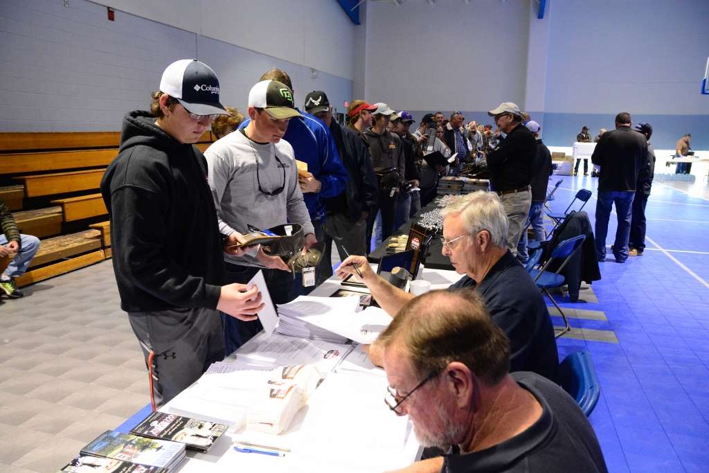 Cameron Mercer and Tyler Presnell of EFCA Fishing Team in Titus, Ala., make their way through the registration line.