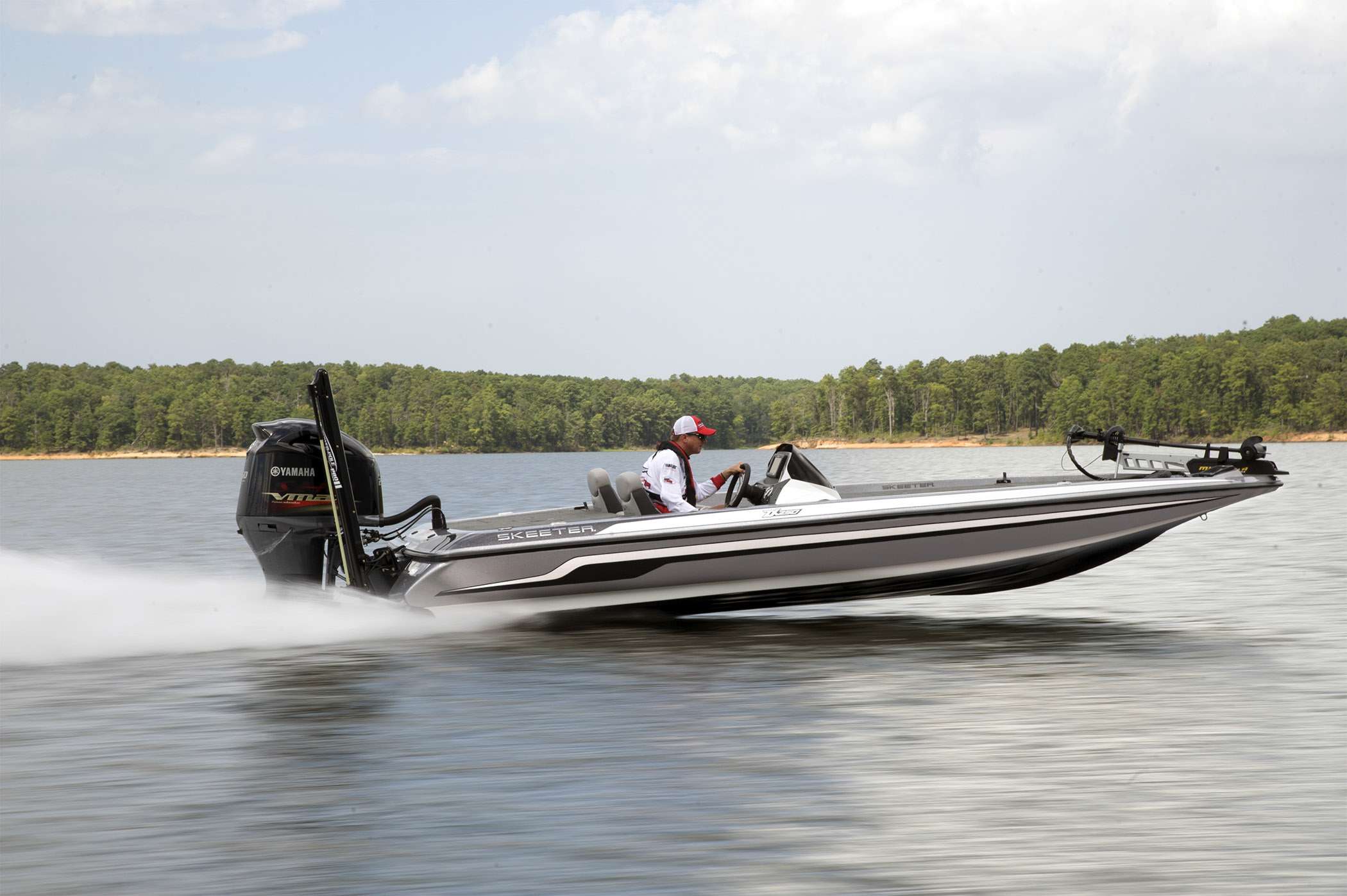 <B>SKEETER ZX225</b>
If you want to be tournament ready the moment you pull your boat from the dealership, this may be the rig for you. This package starts with a 20-foot ZX hull and Yamaha VF225 outboard. Plus, you get two Lowrance HDS-9 Gen 2 touch units, an 8-foot Power-Pole, 112-pound-thrust Minn Kota Fortrex trolling motor and a dozen more high-Â­performance features that used to be big-dollar add-ons. You will roll out of the dealership ready to fish for $48,995. 