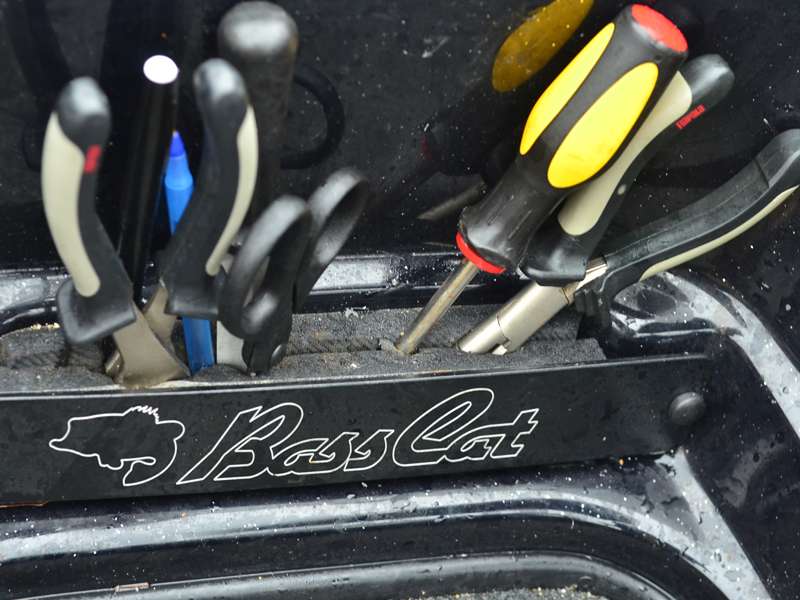 Although his boat might seem cluttered, itâs actually pretty organized. This handy tool holder BassCat builds into the rig helps keep things running smoothly.