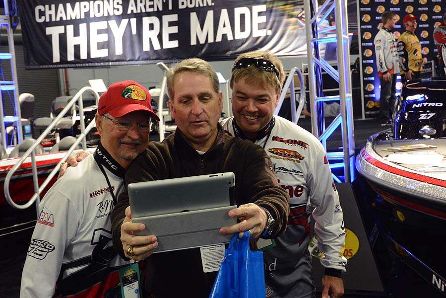At the Bassmaster Classic Expo this is a common scene. A fan takes a selfie with legendary pro Stacey King (left) and Timmy Horton. 