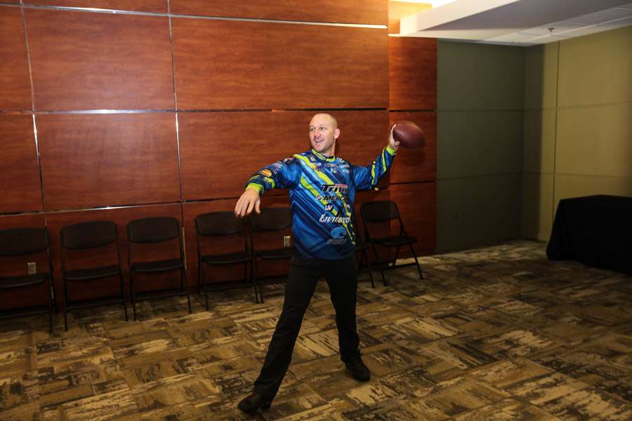 Chapman finds a football in the Green Room, the area where talent (like Mark Zona and Dave Mercer) will decompress before heading out on stage.