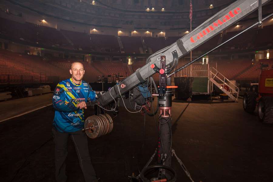 Chapman got to hold the mount for one of the enormous cameras that will capture all the sights and sounds in the arena this weekend.