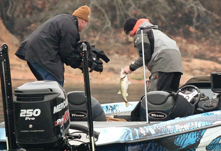 Ashley takes moment to pause and estimate the bassâ weight. 