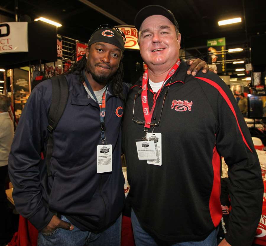 Chicago Bears defensive end Willie Young poses with a fan from Strike King. 